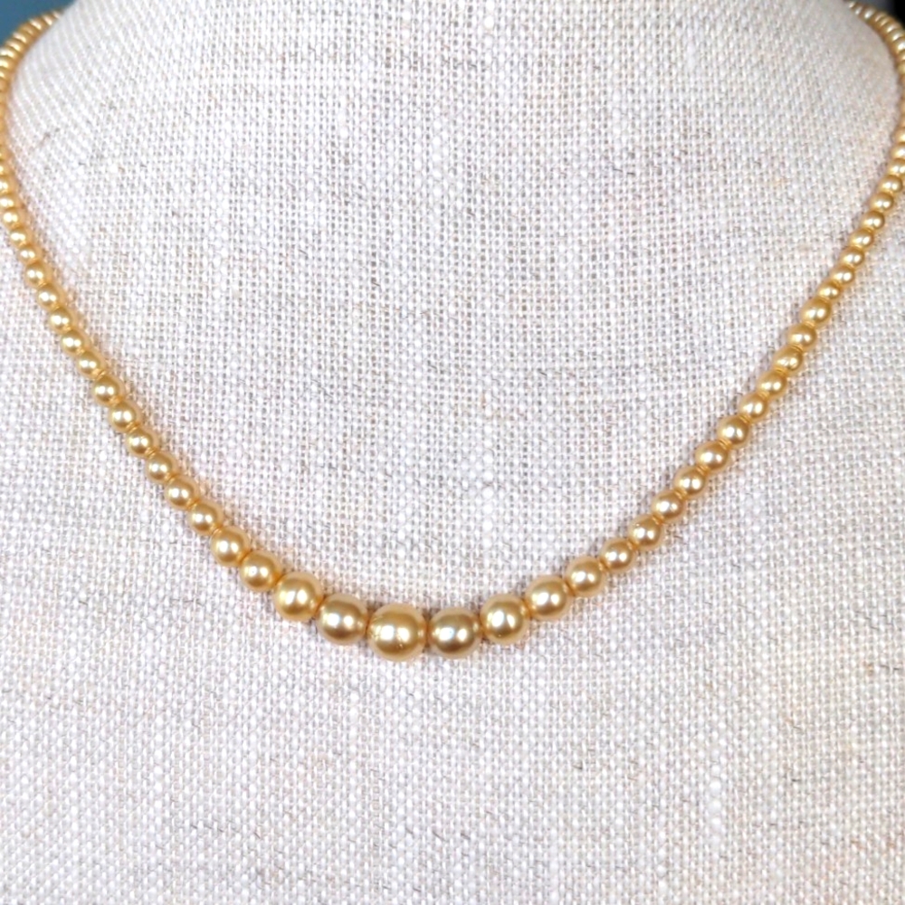 Vintage Japanese Akoya pearl necklace. Sterling .  Candlelight hue.  4-7mm.